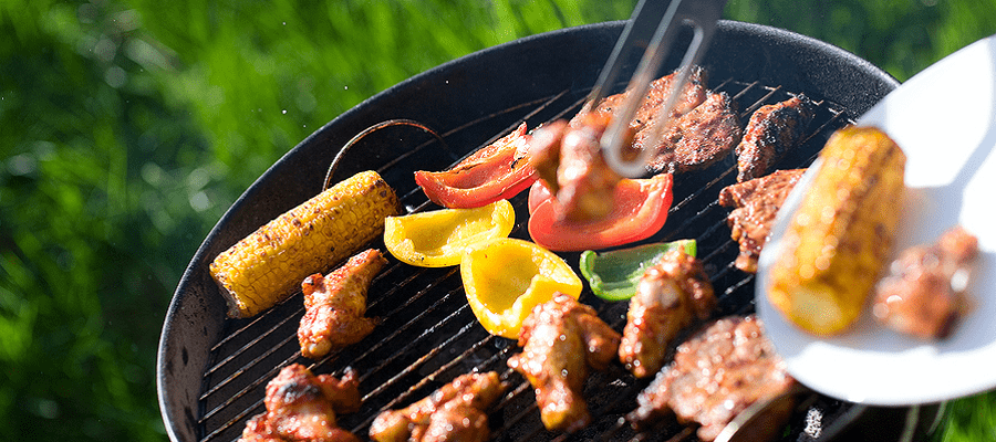 Safe grilling of cooked chicken and raw vegetables